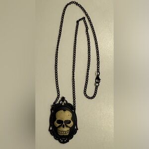 Black Cameo bone skull necklace.